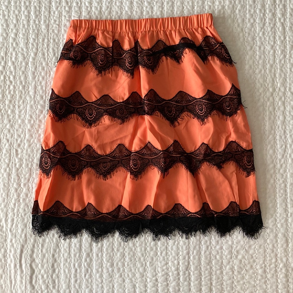 Orange with black lace skirt